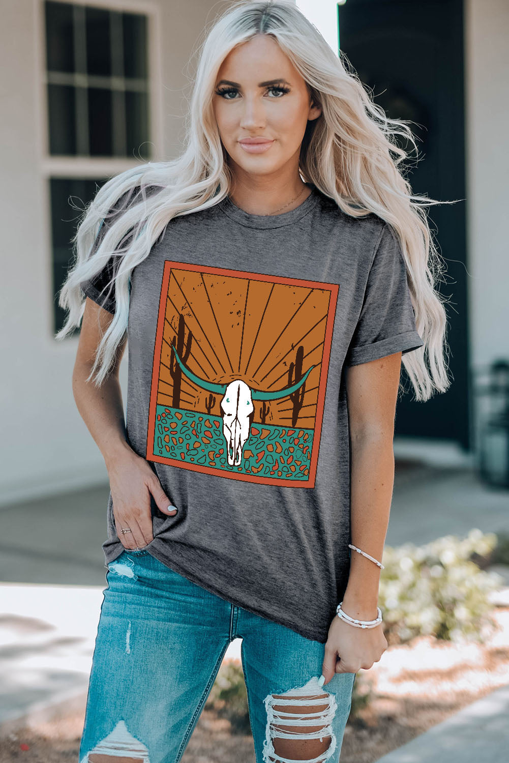 bold cow skull graphic on a gray round necked tshirt