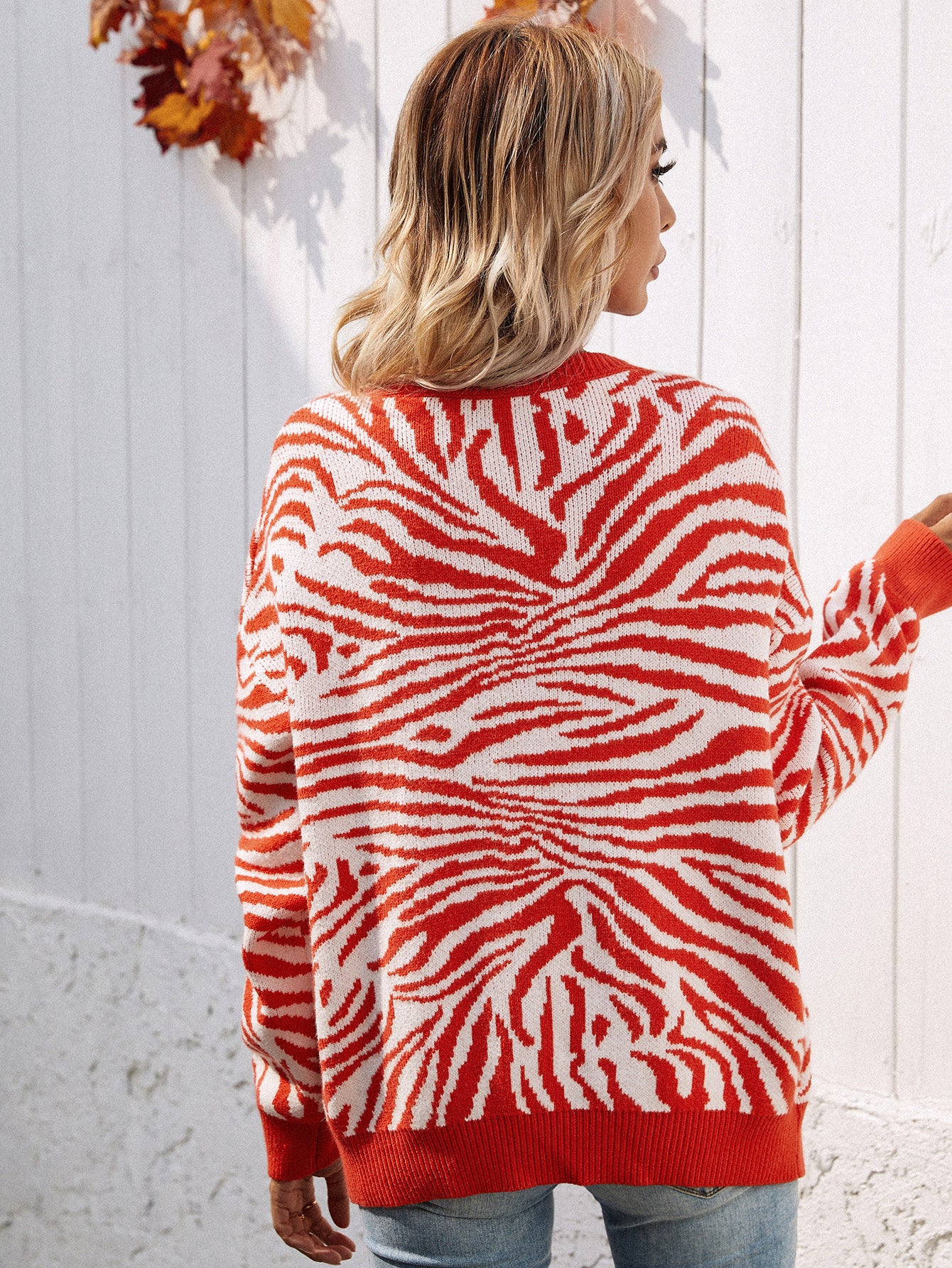 Zebra Print Button Down Cardigan orange back view